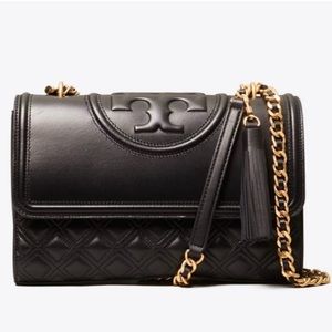 Tory Burch quilted leather shoulder bag. In excellent condition!